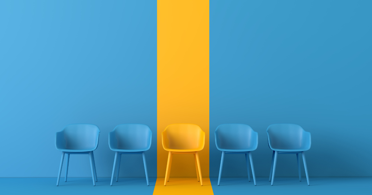 five chairs with on highlighted to show Moving from Graduate Studies to the Workforce: Why You Need a Career Coach