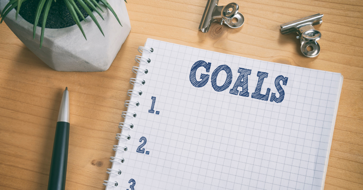 A blank check list of goals to achieve Transitioning from College to the Workforce: Why You Need a Career Coach